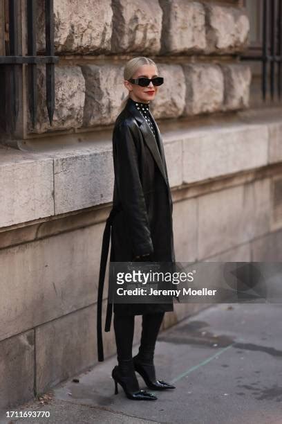 Caro Daur is seen outside Hermes show wearing a full Hermes 